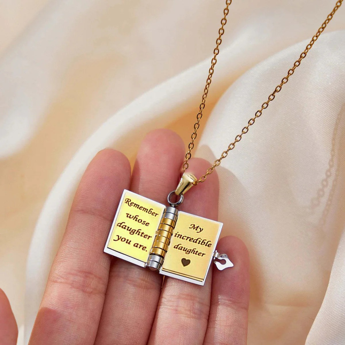 Flip-top engraved book necklace